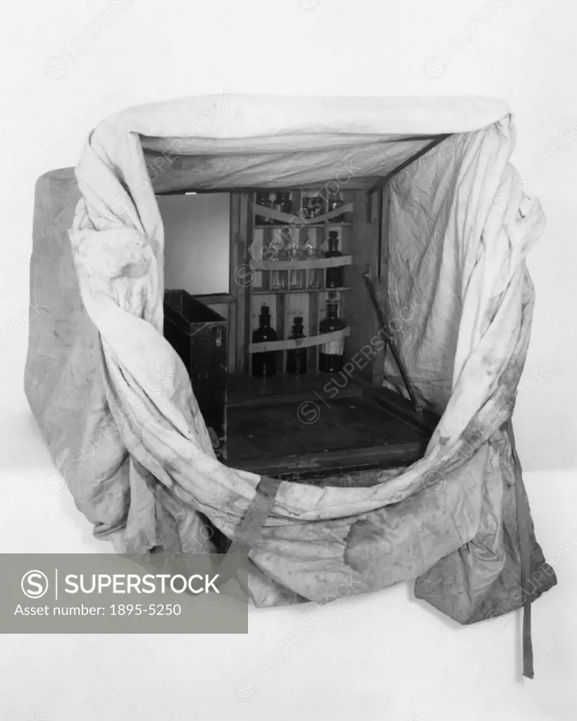 Dark tent used by Sir William Abney, made by Patrick Meagher. The bottles of chemicals used to develop the wet plates are visible.