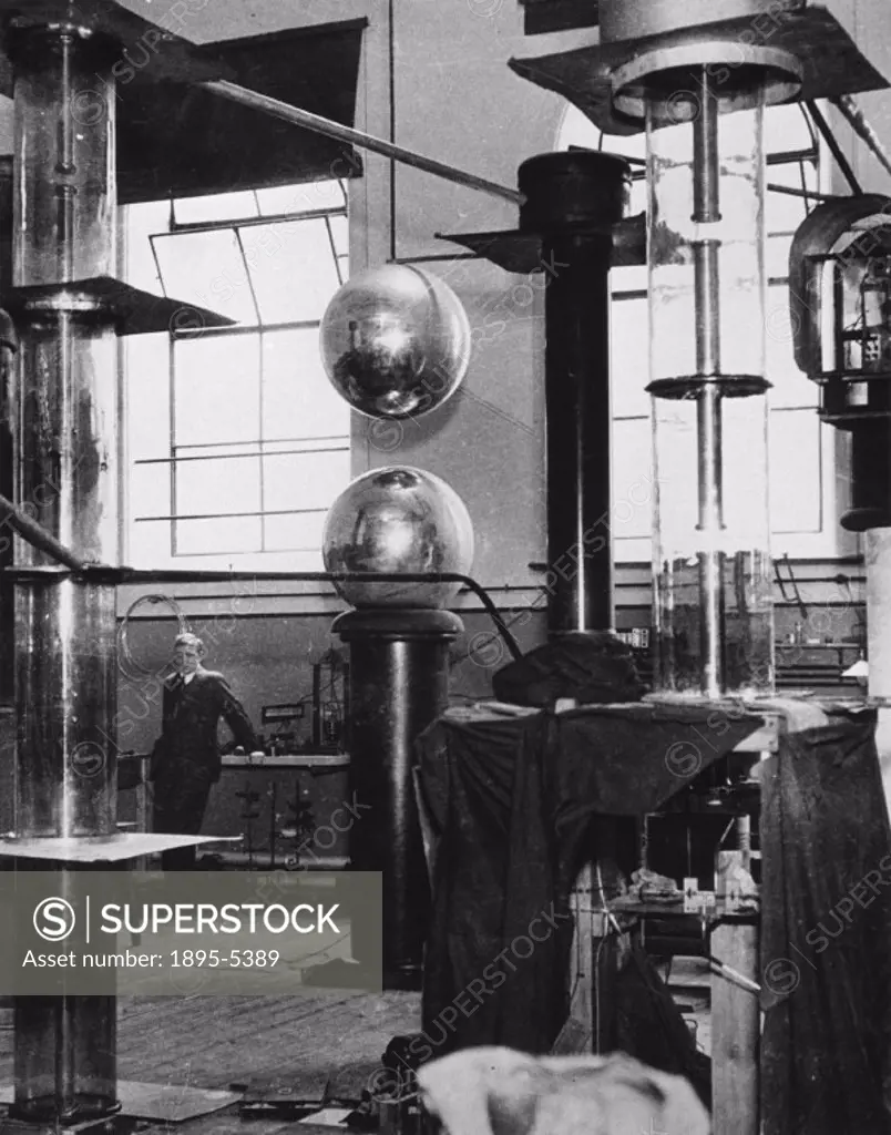 ´Sir John Cockcroft (1897-1967) with the atom smashing apparatus designed by himself and Ernest Walton, at the Cavendish Laboratory at Cambridge Unive...