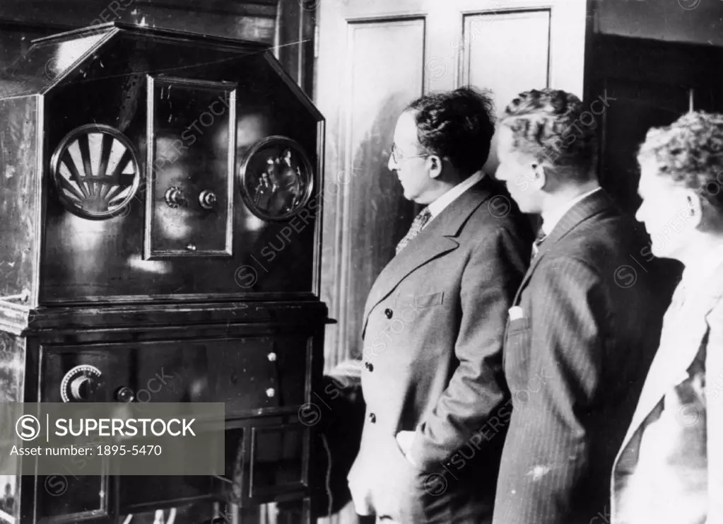 First BBC television transmissions, 1929. First BBC television transmissions, 1929. Photograph shows television experts watching the Baird system tran...