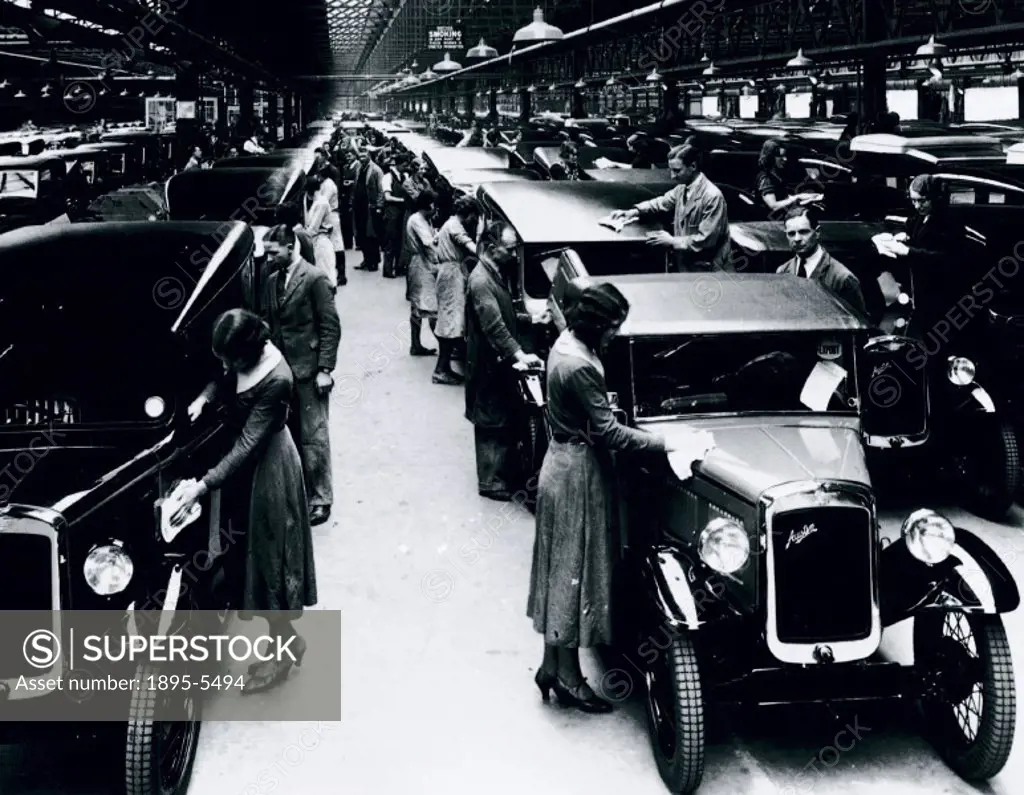Photograph showing workers putting the finishing touches to cars at the Austin Motor Company´s factory at Longbridge, Birmingham. The Austin Motor Com...