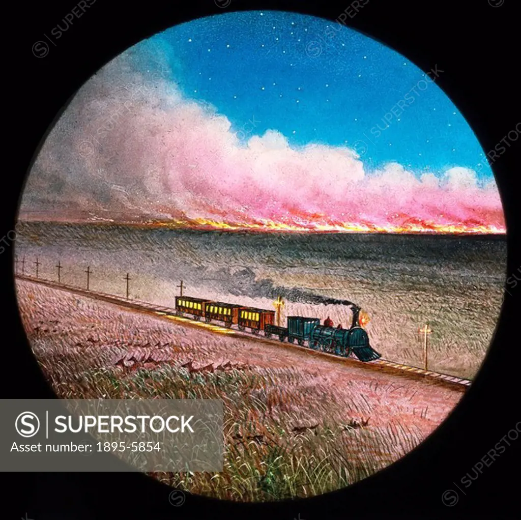 Prairie on fire with train, hand-coloured magic lantern slide, 19th century  Magic lantern shows began towards the end of the 17th century but only be...