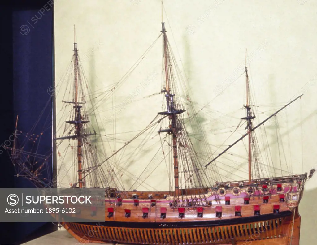 This Navy Board model (scale 1:48) represents a ship of the very early years of the reign of Queen Anne (vide A R monogram), before the 1703 Admiralty...