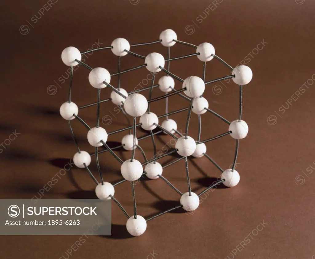 A ball and spoke structural model of a crystal structure illustrating the random vibrations of the crystal. Although a crystal is a solid, it can stil...