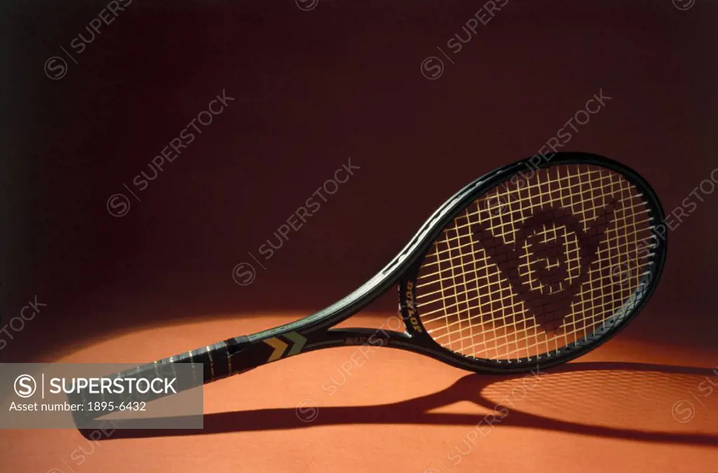 This tennis racket is made from carbon fibre in nylon reinforced plastic. Carbon fibres were first manufactured in the 1960s, by heating acrylic fibre...