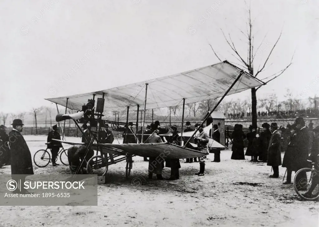 Photograph of the aircraft during trials, surrounded by interested onlookers. De Pischoff was one of the early European pioneers of powered flight. Al...