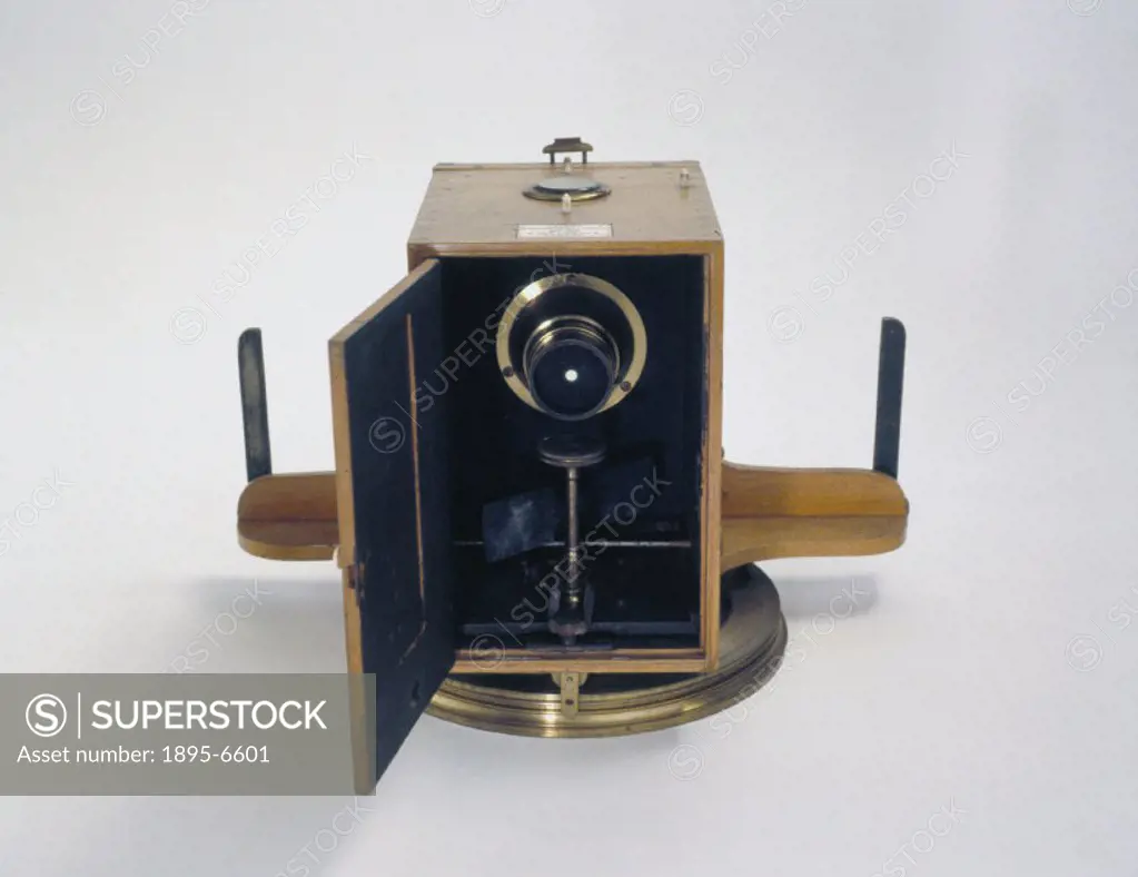 This box-form camera, made by Johnson and Harrison, was one of the first to be designed to take panoramic photographs on glass plates. The images it p...