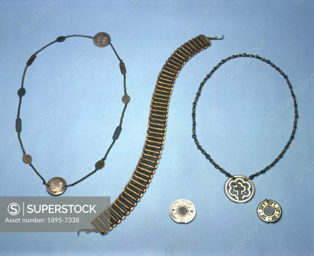 ´Left to right: Galvanic necklace with eleven charms, by Castella, Paris, France, 1880-1920; Galvanic Pulvermacher belt in wood base, belt made by J L...