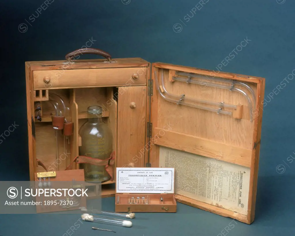 A transfusion kit consisting of connecting tubes, a glass storage jar, and hollow needles and tubes for bleeding the donor and introducing blood into ...