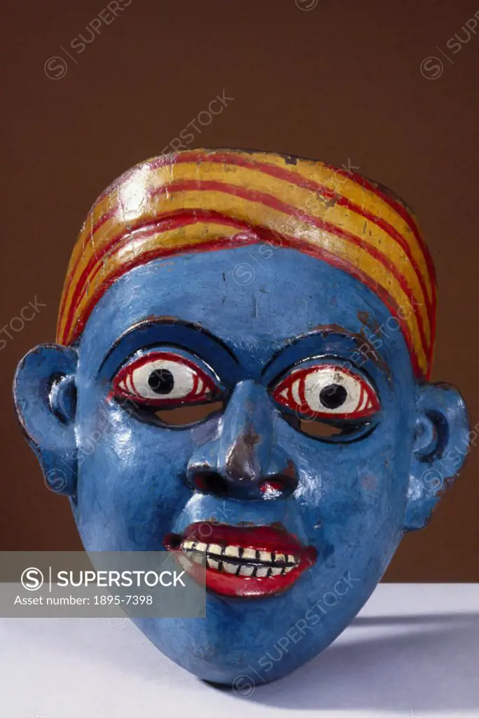 A polychrome wooden disease mask in the form of a human face, worn during healing and exorcism rituals. In some forms of traditional medicine, healing...