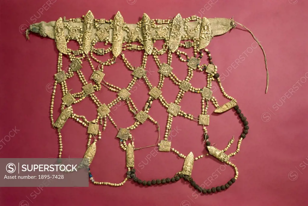 A Buddhist priest´s apron, called a nag-pa’, made with carved human bone beads strung on threads, and used in necromantic rites. In Tibetan religion,...