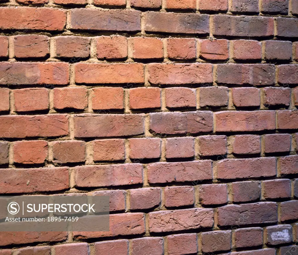 Photograph of a section of a wall made from bricks. Bricks have been manufactured for construction since ancient times. The Mesopotamians discovered t...