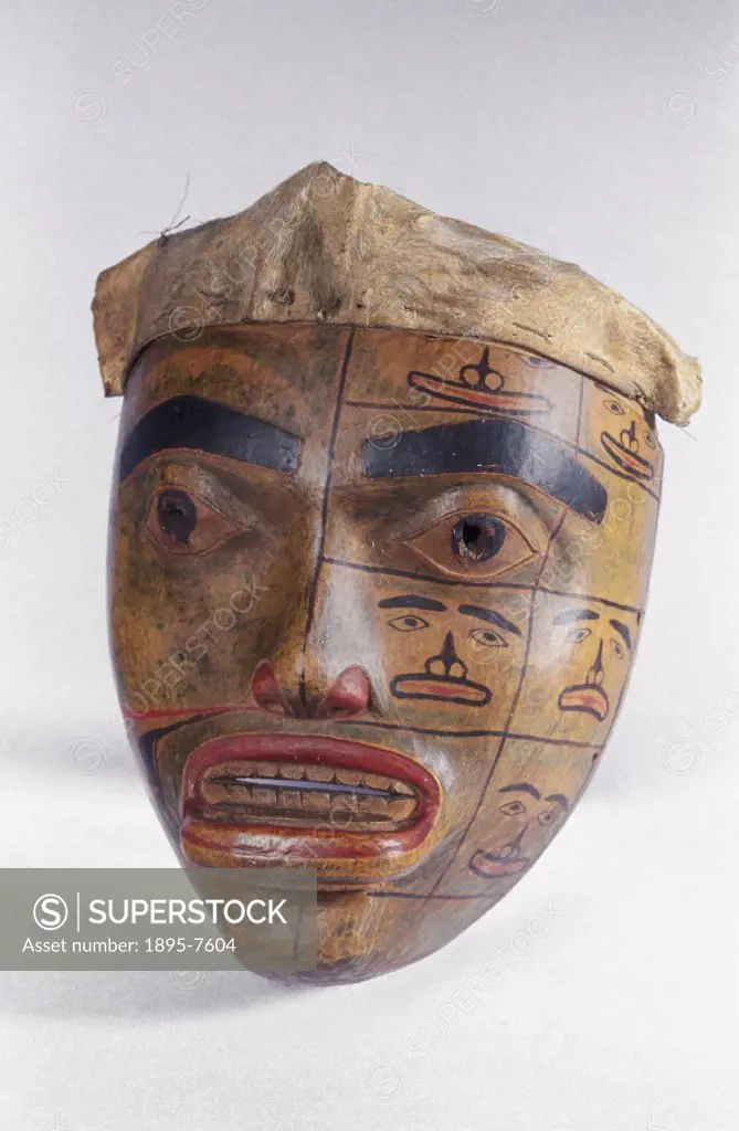 A carved wooden Native American mask, from British Columbia, Canada. Masks were used by medicine men in Native American rituals.