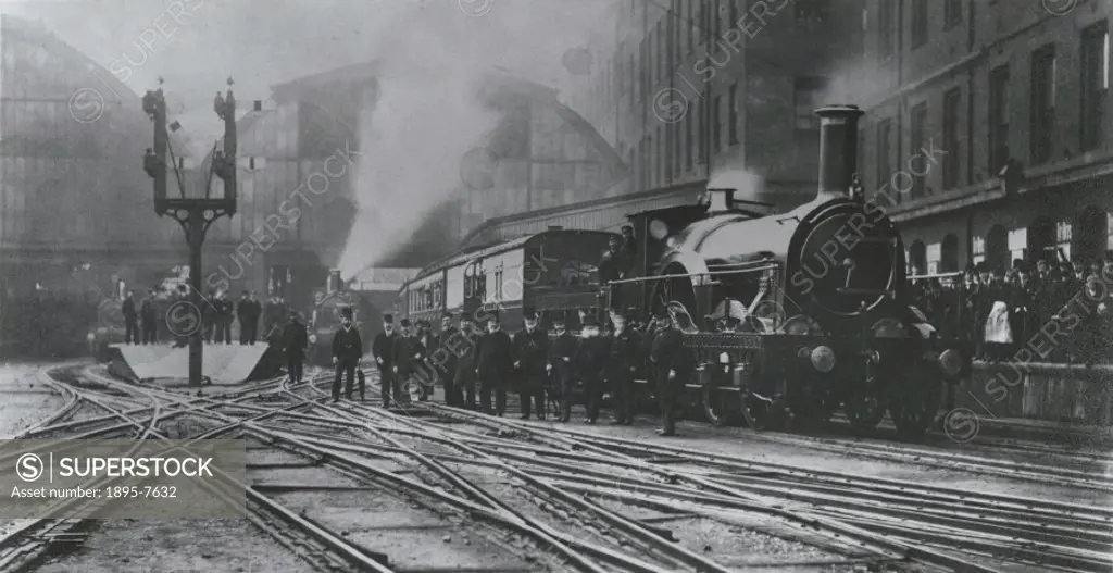 Photograph showing a train leaving Paddington Station in London. The broad gauge used on the Great Western Railway (GWR), designed by Isambard Kingdom...