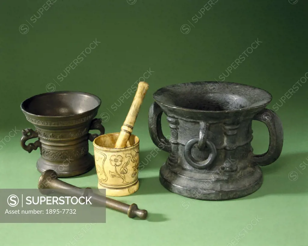 From left to right: Dutch mortar, 1592, ivory European pestle and mortar, 1500-1700, and English mortar, 1300-1500. These implements were used to grin...