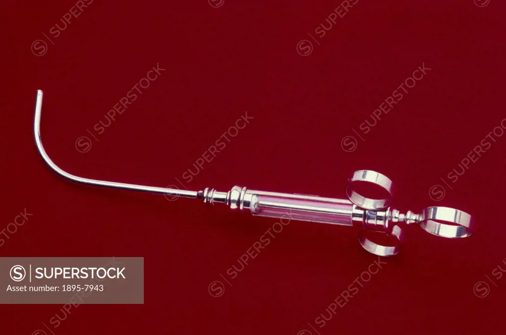 This steel and glass syringe was designed by Professor Adelbert von Tobold (1827-1907), the German laryngologist, and made by Down Bros of London. It ...