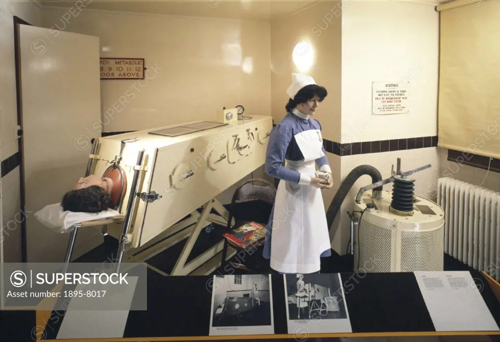 Reconstruction in the Lower Wellcome Gallery, Science Museum, London. This particular iron lung was presented by Viscount Nuffield to the Memorial Hos...