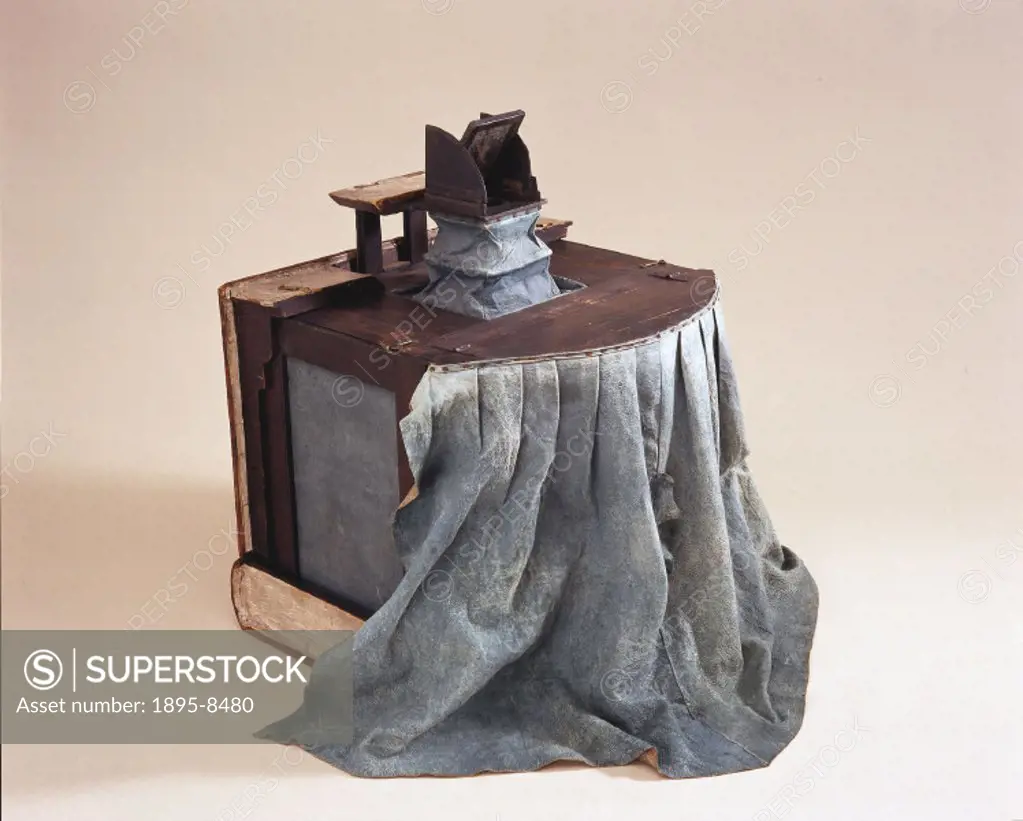 Sir Joshua Reynolds, the famous English portrait painter, used this early form of camera obscura. It is fitted with a mirror and lens that allows an i...