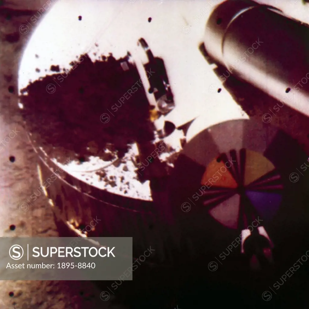 This colour picture, showing the spacecraft´s footpad and the photometric target, was constructed using three colour filters and three black and white...