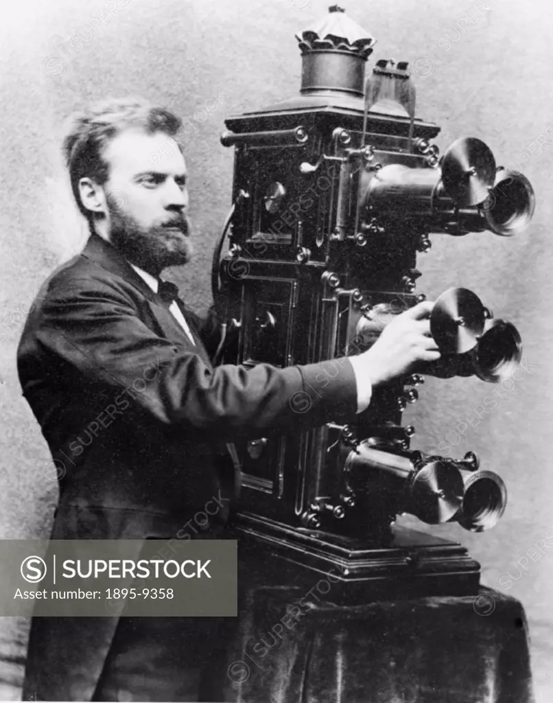 Photograph of C Goodwin Norton operating a three lens triunial lantern. Norton was a well known lantern entertainer of the 1890s. The triunial lantern...