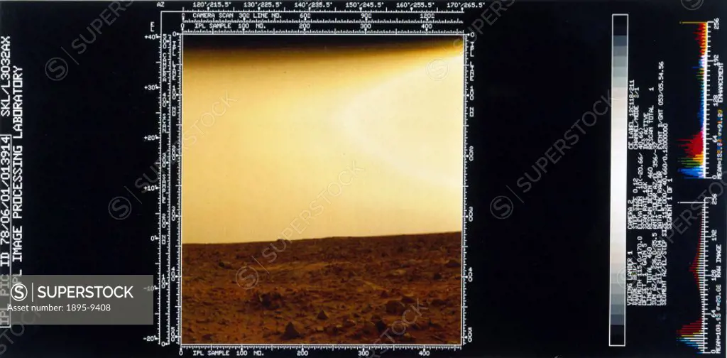 This shows a flat rock-strewn surface with a pink sky. Two Viking spacecraft were launched towards Mars in 1975, each carrying a lander spacecraft and...