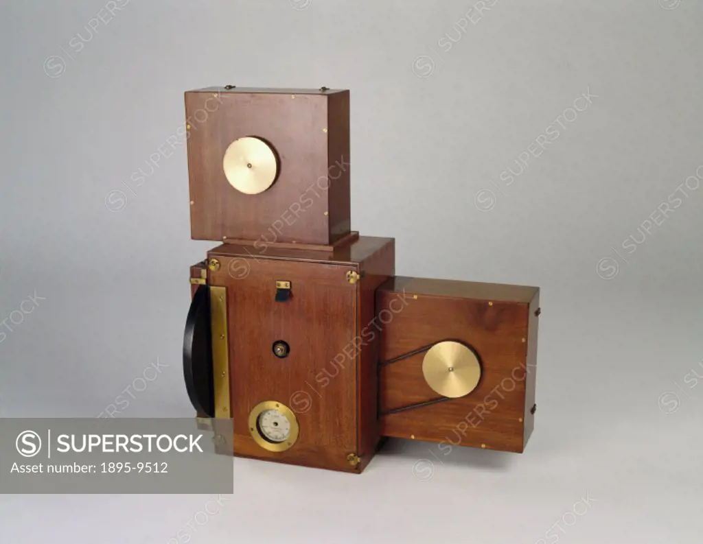 Prestwich Kinematograph camera, 1898. J A Prestwich made this camera in a wooden case for wide film. Although 35mm film was adopted as the standard fo...