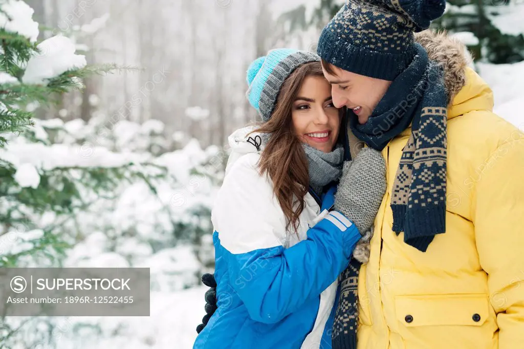 Passionate couple during winter season. Debica, Poland
