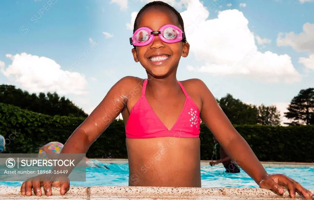 Portrait of girl in outdoor swimming pool, Johannesburg, Gauteng Province, South Africa