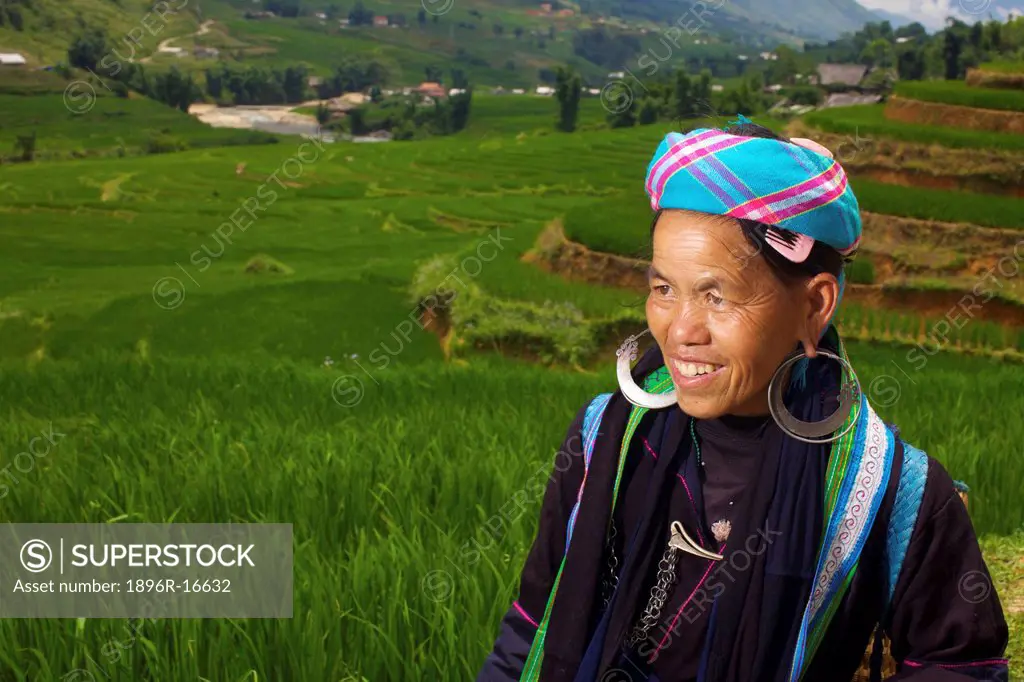 A portrait of a woman on a rice farm, Sapa, Republic of Vietnam, South East Asia