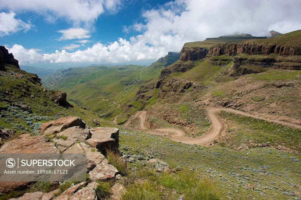 A scenic view of the a trail through the hills of the Sani Pass, Drakensberg Park, KwaZulu_Natal, South Africa