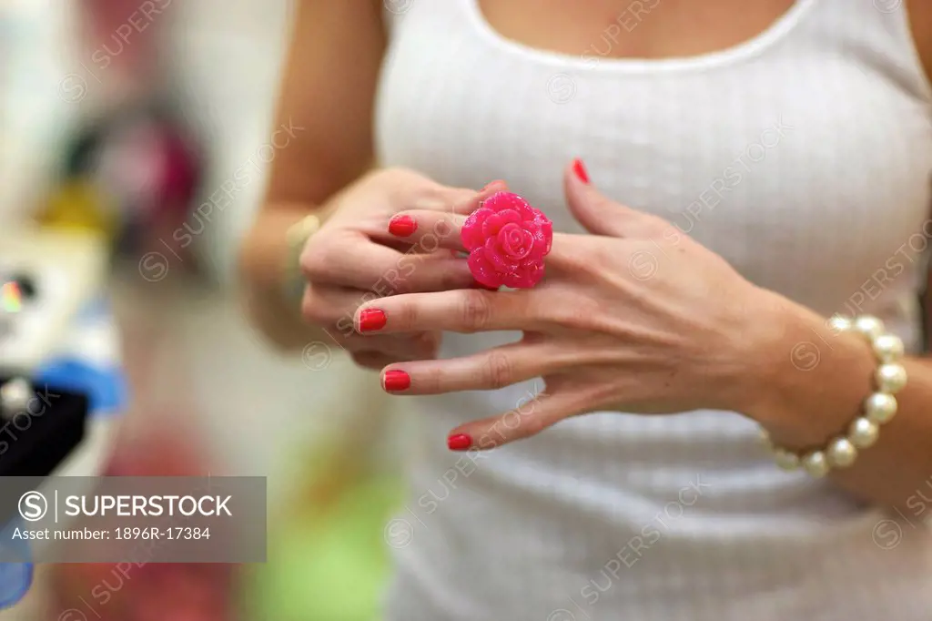 A close_up of young a woman trying on a ring, Pietermaritzburg, KwaZulu_Natal, South Africa