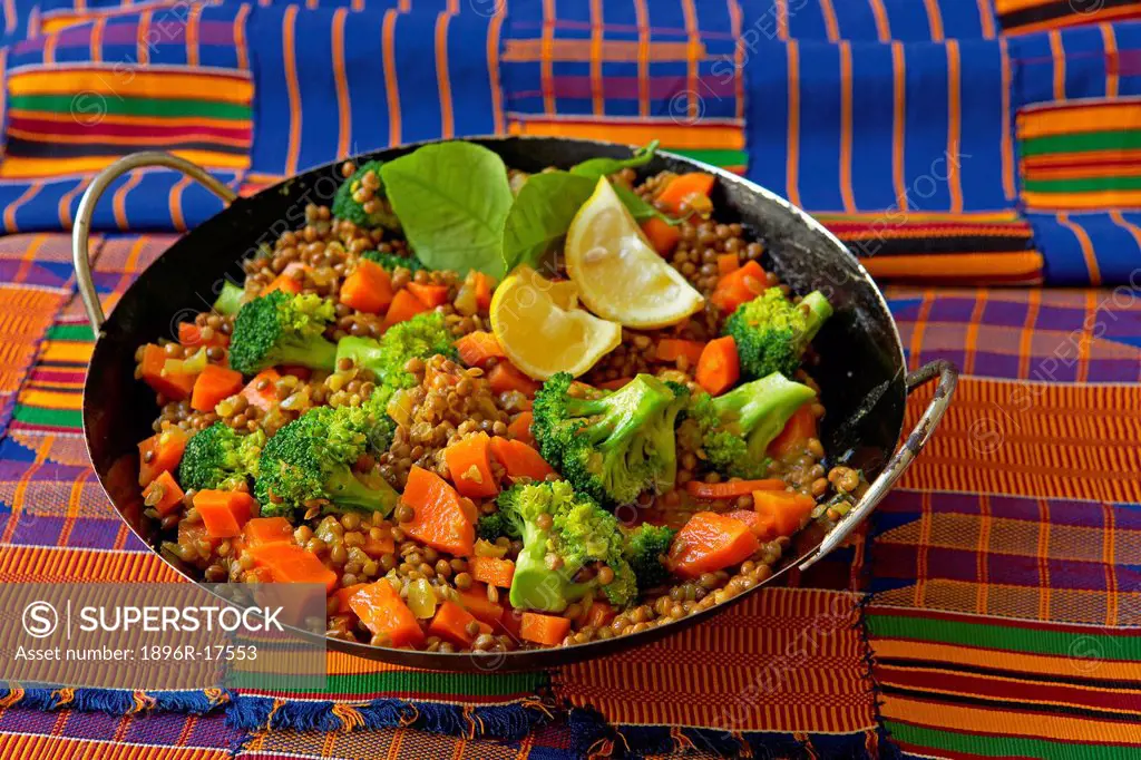 Traditional African cooking. Lentil dhal with vegetables