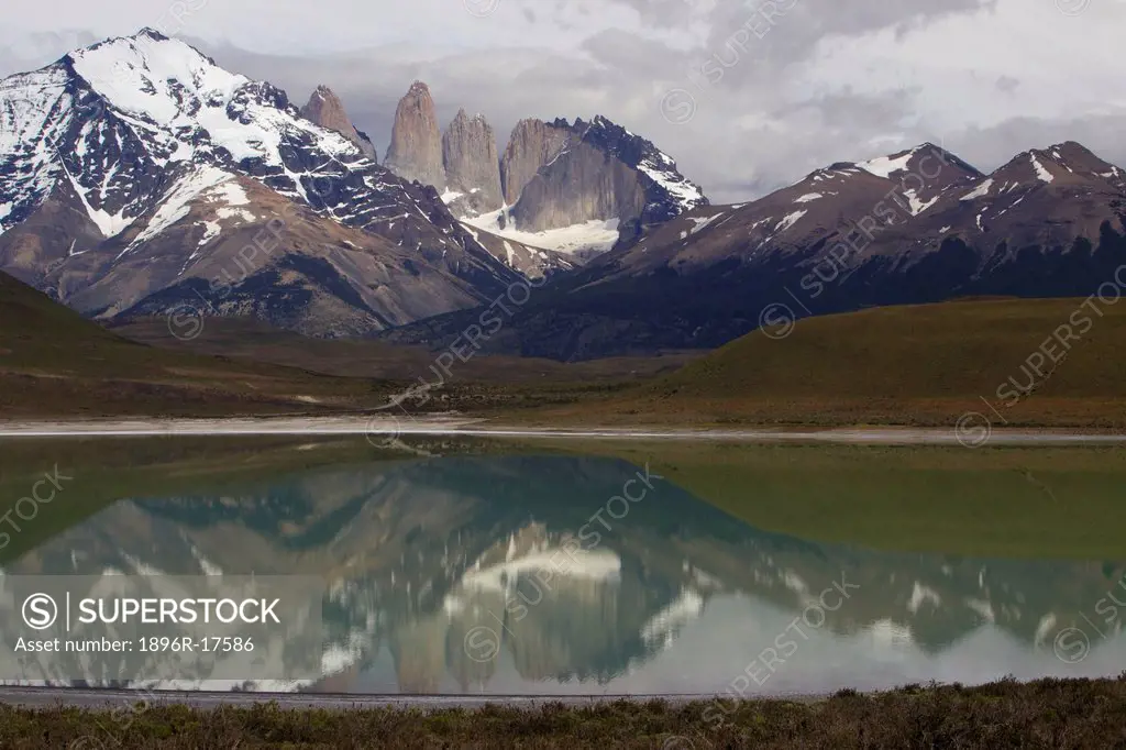 A view of Torres del Paine reflected in a lake, Torres del Paine National Park, Patagonia, Chile, South America
