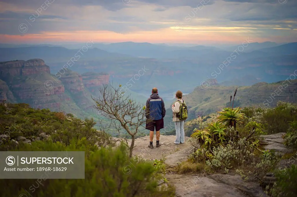 Hikers enjoy the view of Three Rondavels from Mariepskop Mountain, Limpopo Province, Mpumalanga Province, South Africa
