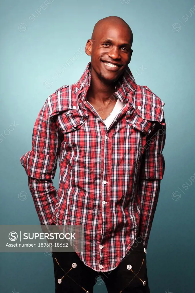 Portrait of young man in checked shirt