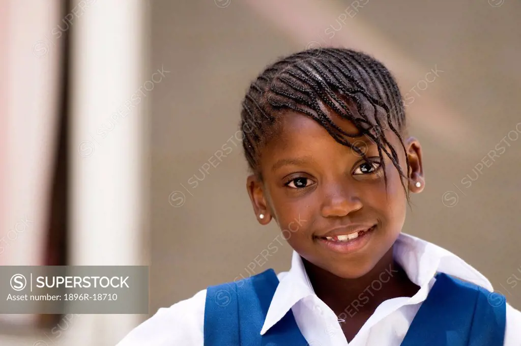 Portrait of a happy African school girl looking at camera. Windhoek, Namibia.