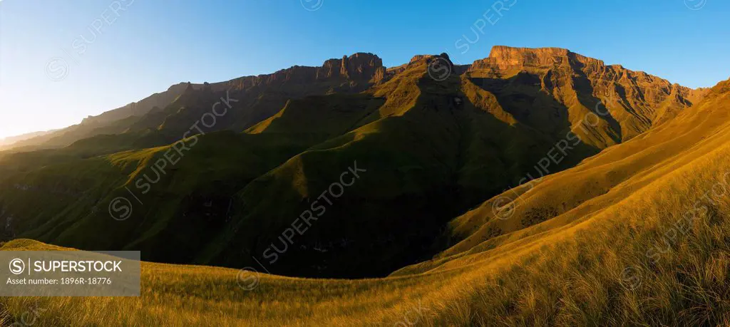 Panoramic view of the Cathedral Peak mountains viewed from the uMhlambonja valley. Drakensberg, South Africa