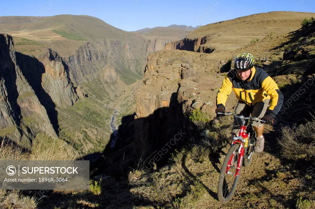 Mountain Biking Above the Maletsunyane River Gorge  Maletsunyane, Lesotho, Southern Africa