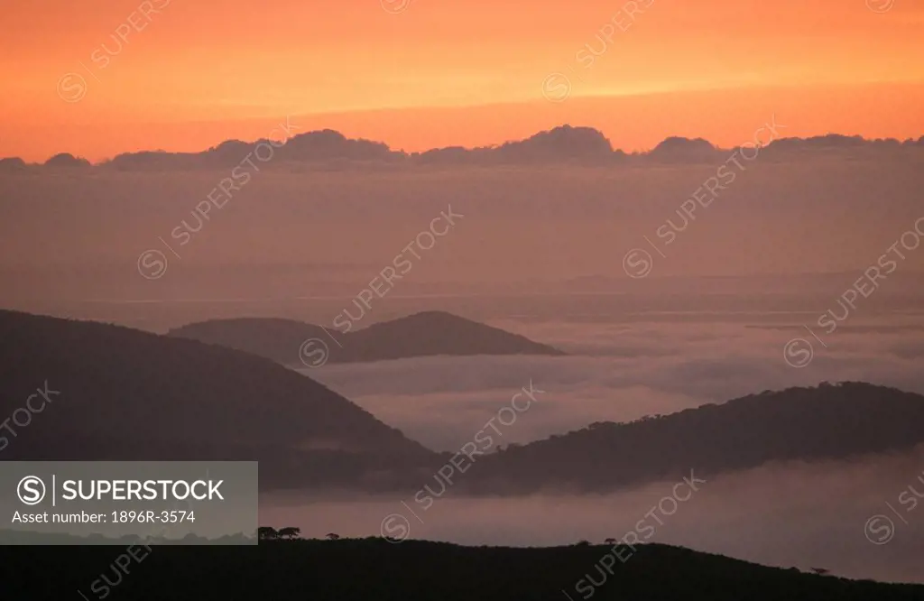 Scenic View of a Misty Mountain at Sunrise  Hluhluwe Umfolozi Park, Kwa-Zulu Natal Province, South Africa
