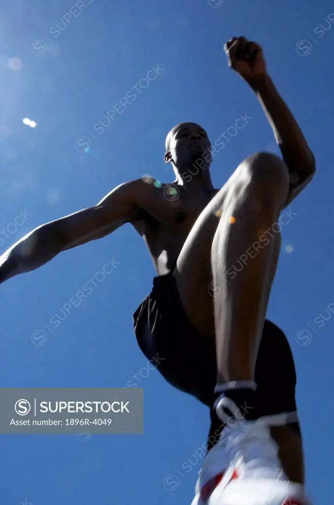 Low Angle View of Athlete Jumping  Cape Town, Western Cape Province, South Africa
