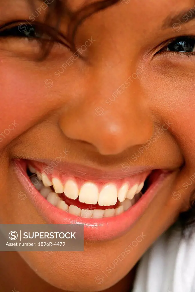 Portrait of a Mixed Race Woman Smiling - Close-Up  Cape Town, Western Cape
