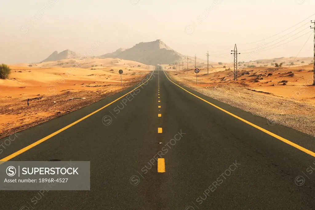 View Down an Abandoned Desert Road  Dubai, United Arab Emirates, Middle East