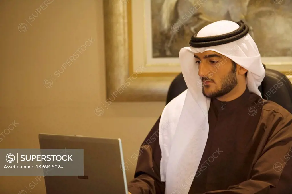 Arab Business Man Working on Computer in Office  Dubai, United Arab Emirates
