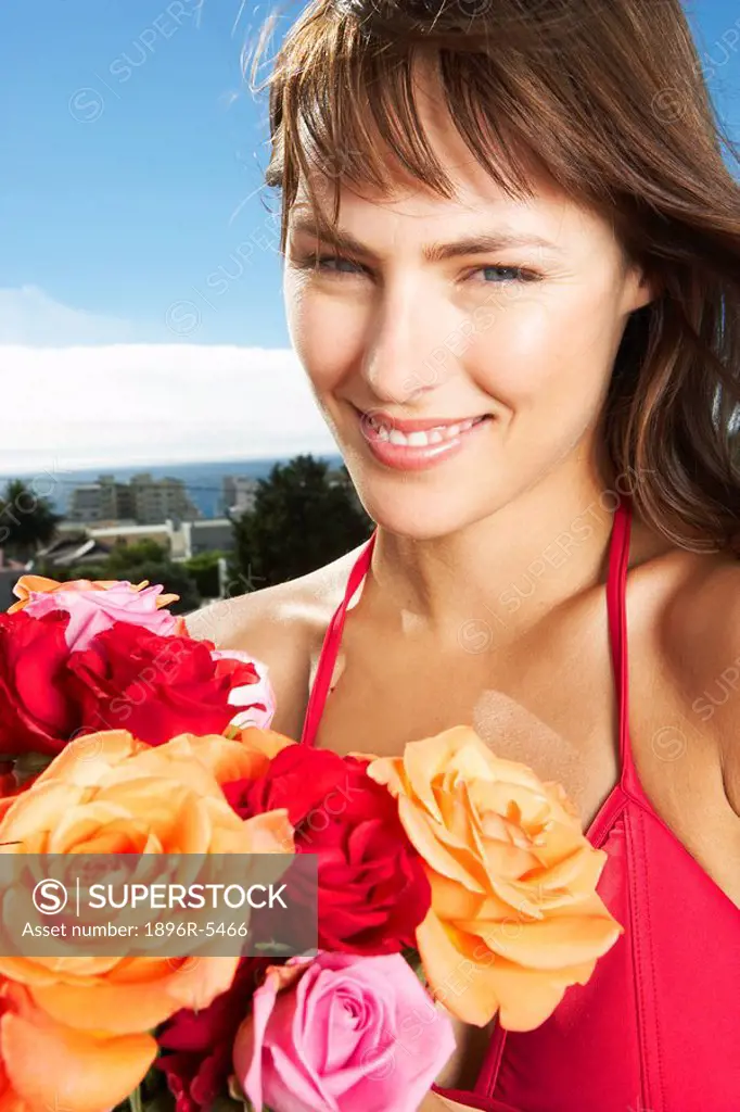 Woman in a Bikini Holding a Boquet of Roses  Cape Town, Western Cape Province, South Africa