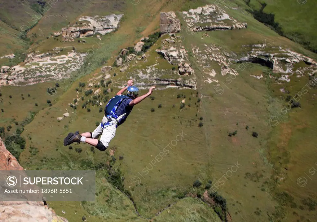 Base Jumper in Mid Air  Golden Gate National Park, Freestate Province, South Africa