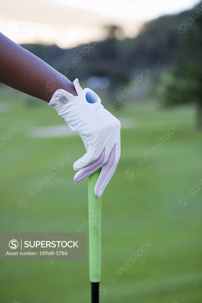 Close Up of Womans Hand on Golf Club  Clovelly Golf Course, Cape Town, Western Province, South Africa