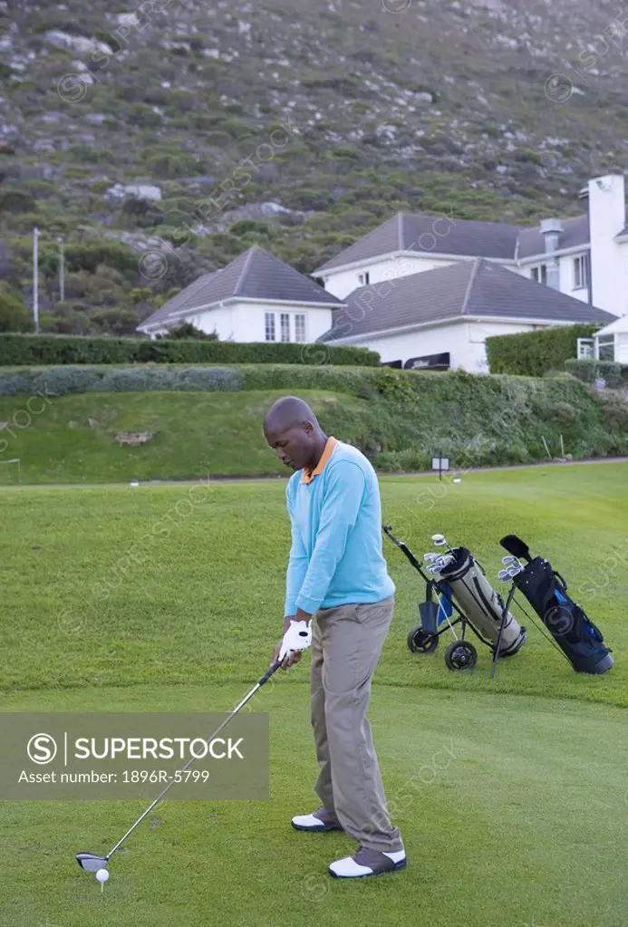 Man Addressing Golf Ball  Clovelly Golf Course, Cape Town, Western Province, South Africa