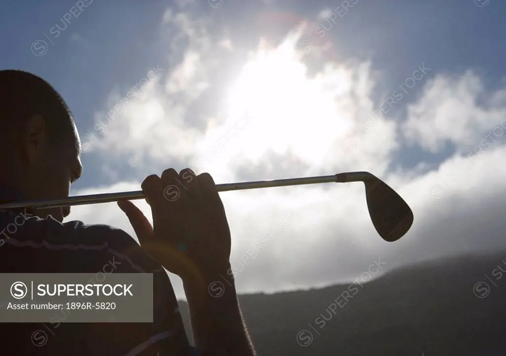 Silhouette of Man Holding Golf Club  Clovelly Golf Course, Cape Town, Western Province, South Africa