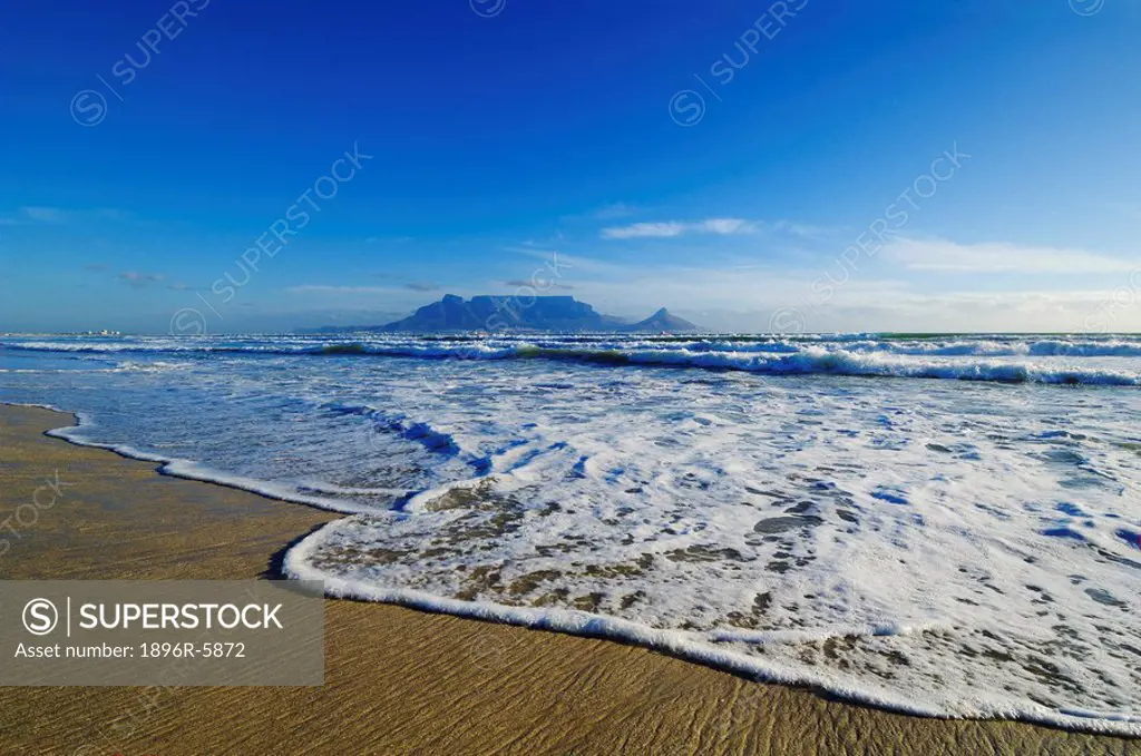 The classic view of Table Mountain from Table View Beach, Cape Town, Western Cape Province, South Africa