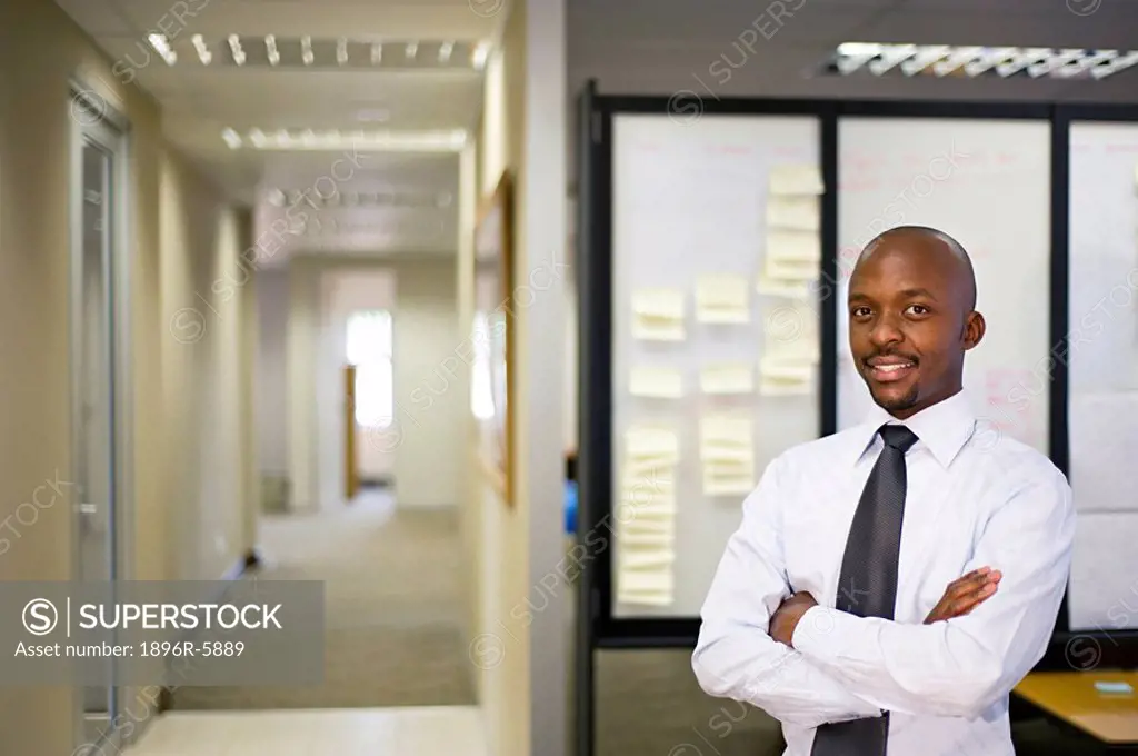 Portrait of a businessman in front of a white board. Pretoria, South Africa