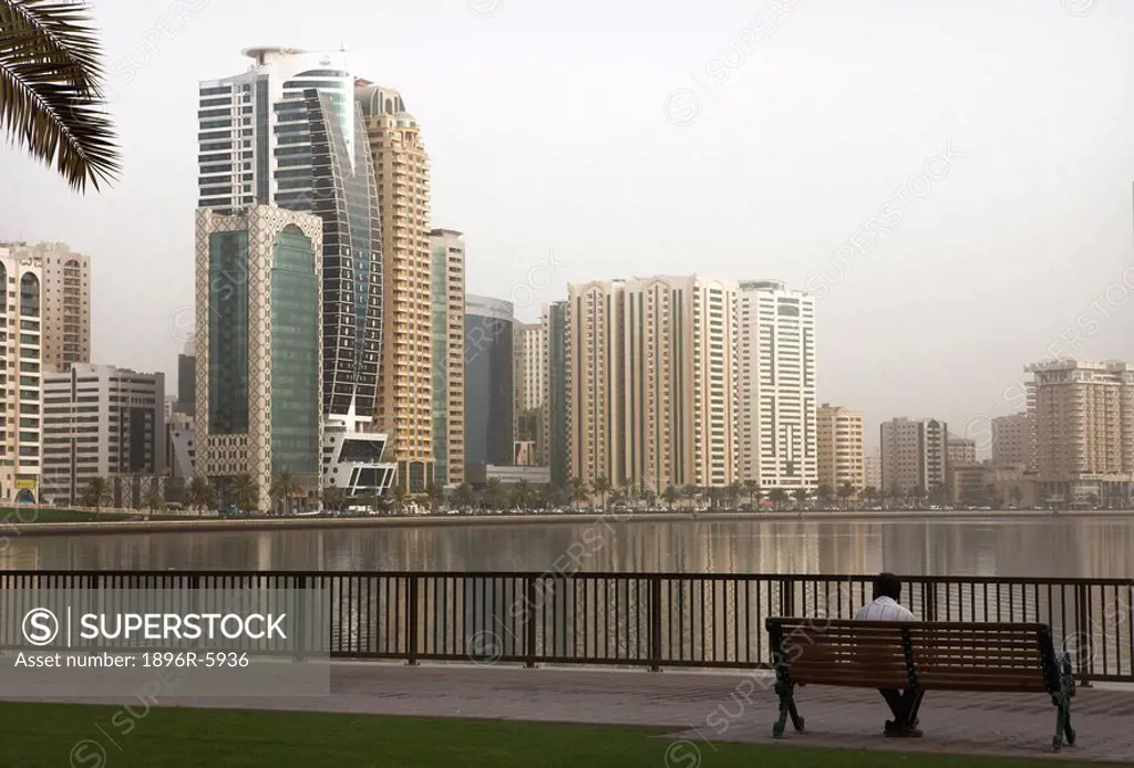 View east across Khalid Lagoon to the corniche, Sharjah, UAE